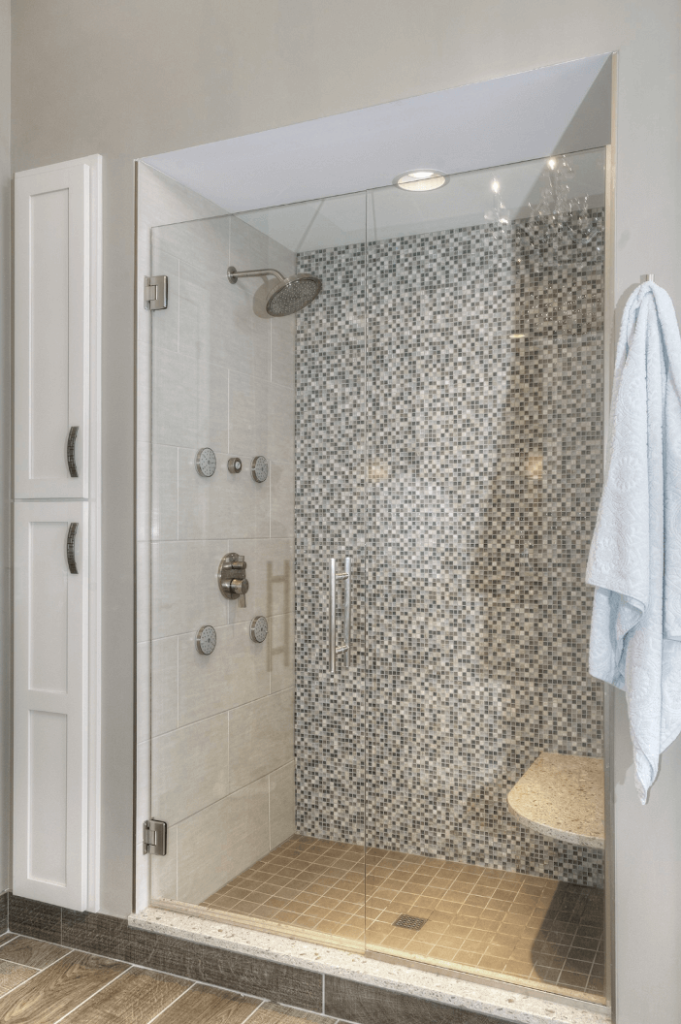 intricate ceramic or glass tiled shower
