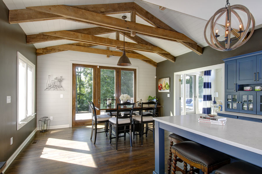 Wooden beams in the dining room draw the eyes up.