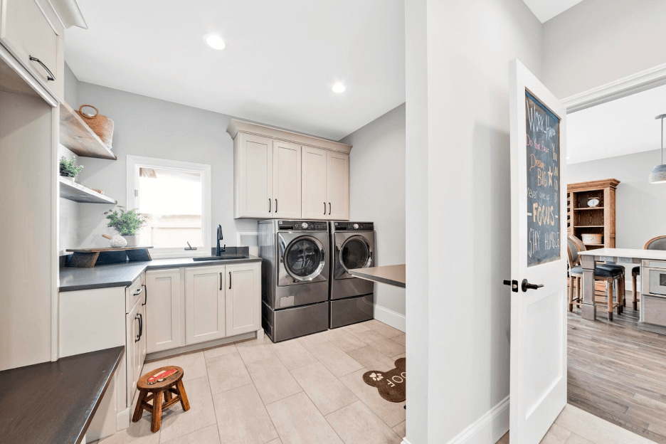 A mudroom/laundry room combination with a plethora of storage.